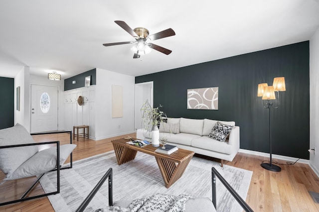 7566 S Swift Rd, Goodlettsville, TN 37072 - living area featuring ceiling fan, wood finished floors, and an accent wall