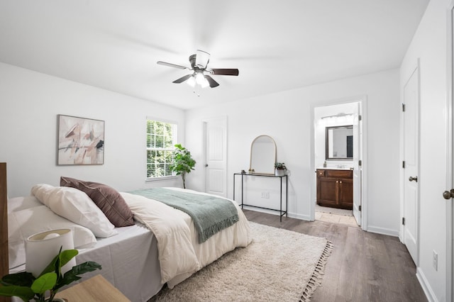 7566 S Swift Rd, Goodlettsville, TN 37072 - bedroom featuring wood finished floors, ensuite bath, and ceiling fan