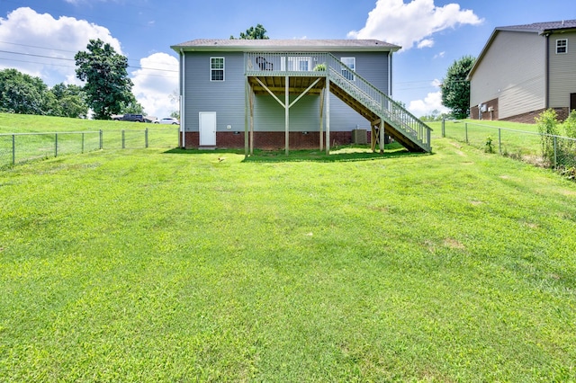 7566 S Swift Rd, Goodlettsville, TN 37072 - back of house featuring stairs, a deck, and a fenced backyard