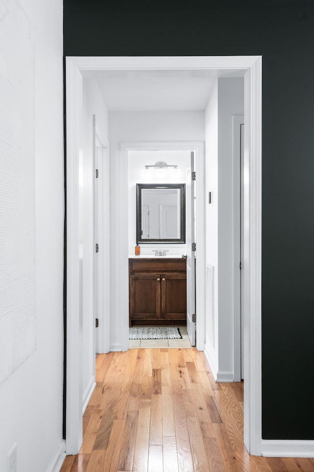 7566 S Swift Rd, Goodlettsville, TN 37072 - hall featuring light wood-type flooring and a sink