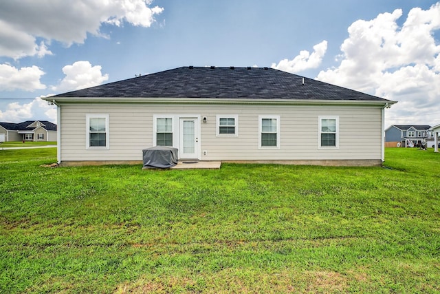77 Frost St, Decherd, TN 37324 - rear view of property featuring a yard