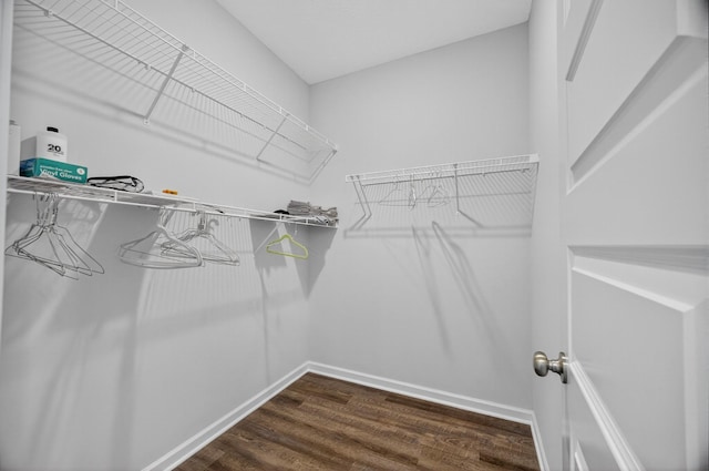 77 Frost St, Decherd, TN 37324 - spacious closet featuring dark wood finished floors