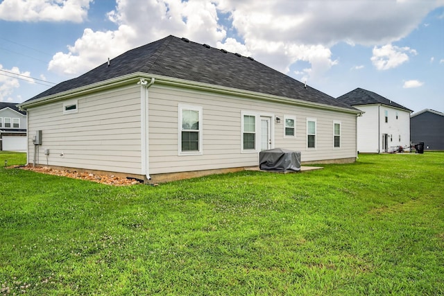 77 Frost St, Decherd, TN 37324 - back of house with a lawn