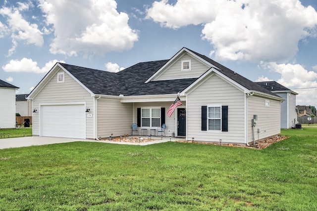 77 Frost St, Decherd, TN 37324 - view of front of house featuring an attached garage, a front yard, and driveway
