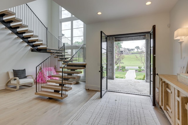 7555 Whiskey Rd, College Grove, TN 37046 - foyer entrance featuring stairs, light wood finished floors, and recessed lighting