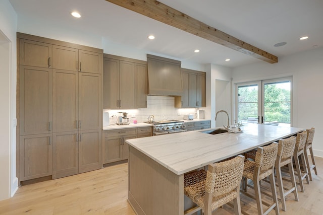 7555 Whiskey Rd, College Grove, TN 37046 - kitchen with custom range hood, high end stove, beam ceiling, recessed lighting, and light wood-style flooring