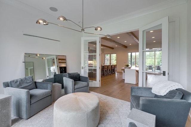 7555 Whiskey Rd, College Grove, TN 37046 - living room with light wood finished floors, recessed lighting, a chandelier, french doors, and beam ceiling