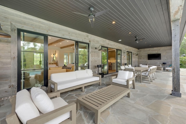 7555 Whiskey Rd, College Grove, TN 37046 - view of patio featuring an outdoor living space, a ceiling fan, and outdoor dining area