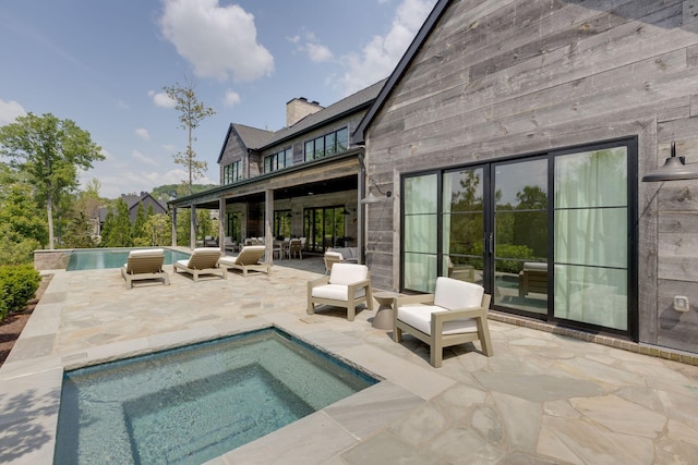 7555 Whiskey Rd, College Grove, TN 37046 - swimming pool featuring a patio and an in-ground hot tub