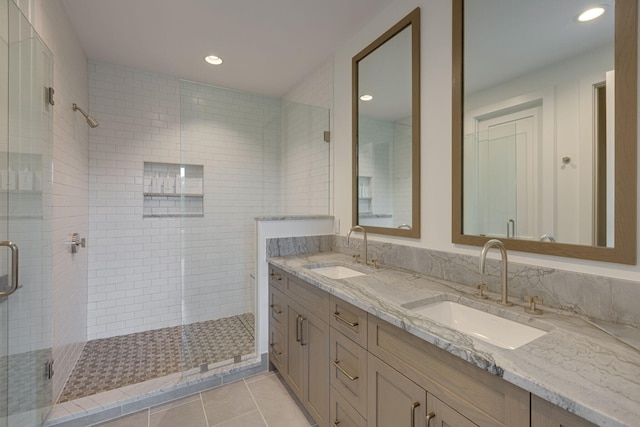 7555 Whiskey Rd, College Grove, TN 37046 - full bath with double vanity, a shower stall, recessed lighting, and tile patterned floors