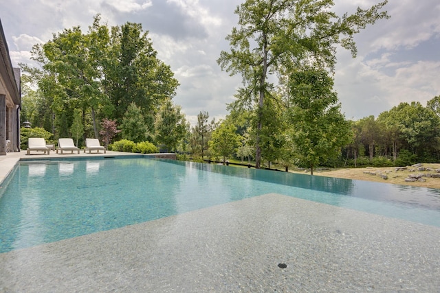 7555 Whiskey Rd, College Grove, TN 37046 - view of swimming pool featuring an infinity pool