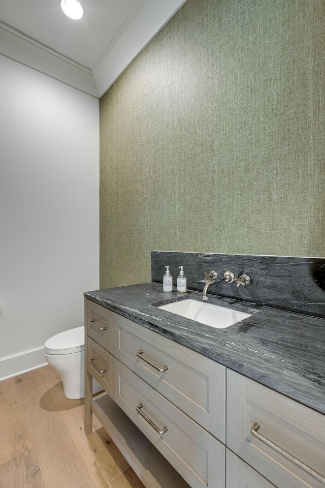 7555 Whiskey Rd, College Grove, TN 37046 - half bath featuring vanity, wood finished floors, and ornamental molding