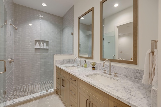 7555 Whiskey Rd, College Grove, TN 37046 - bathroom featuring double vanity, tiled shower, recessed lighting, and tile patterned flooring