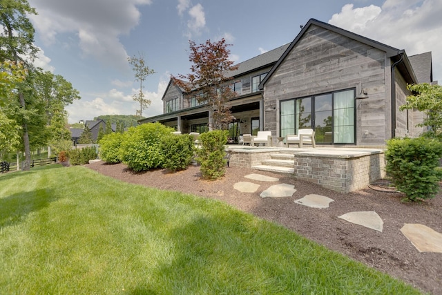 7555 Whiskey Rd, College Grove, TN 37046 - back of property featuring a patio area