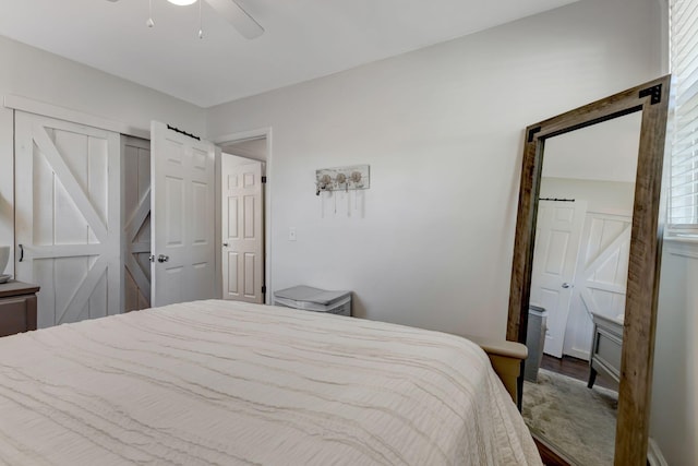 4985 Shihmen Dr, Antioch, TN 37013 - bedroom with wood finished floors, a closet, and a ceiling fan