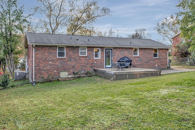 4985 Shihmen Dr, Antioch, TN 37013 - rear view of property with a fenced backyard, brick siding, a wooden deck, and a shingled roof