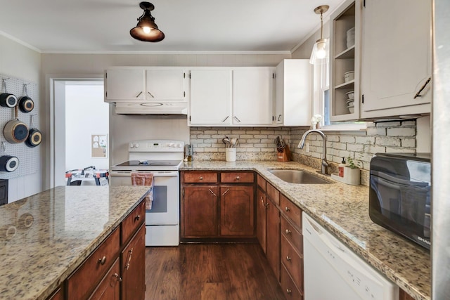 4985 Shihmen Dr, Antioch, TN 37013 - kitchen with white appliances, under cabinet range hood, dark wood-style floors, crown molding, and tasteful backsplash