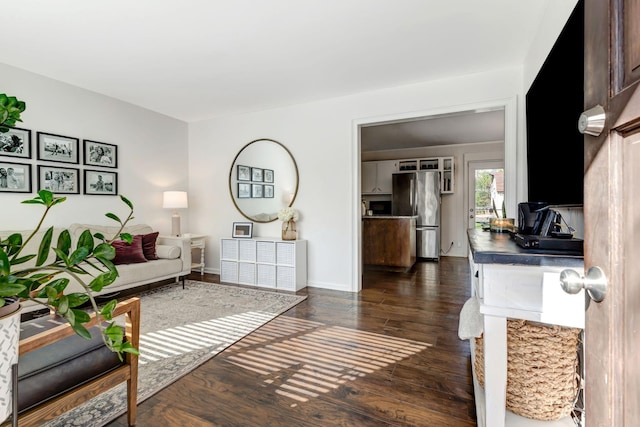 4985 Shihmen Dr, Antioch, TN 37013 - living room with dark wood-type flooring and baseboards
