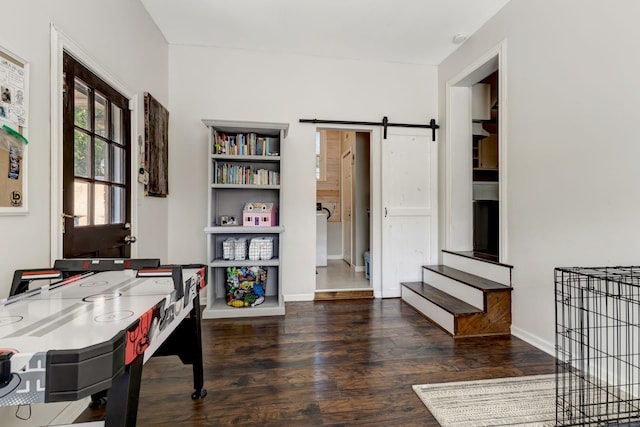 4985 Shihmen Dr, Antioch, TN 37013 - office area featuring wood finished floors and a barn door