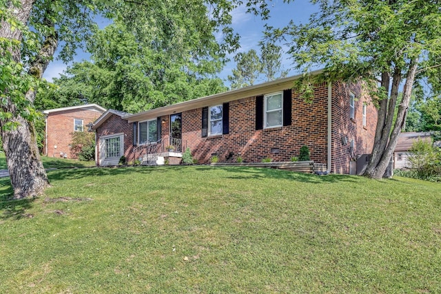 4985 Shihmen Dr, Antioch, TN 37013 - ranch-style home featuring brick siding and a front lawn