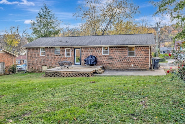 4985 Shihmen Dr, Antioch, TN 37013 - rear view of house featuring a wooden deck, brick siding, and a shingled roof