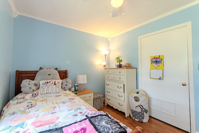 996 Matrose Carrolls Rd, Michie, TN 38357 - bedroom featuring crown molding, wood finished floors, and a ceiling fan