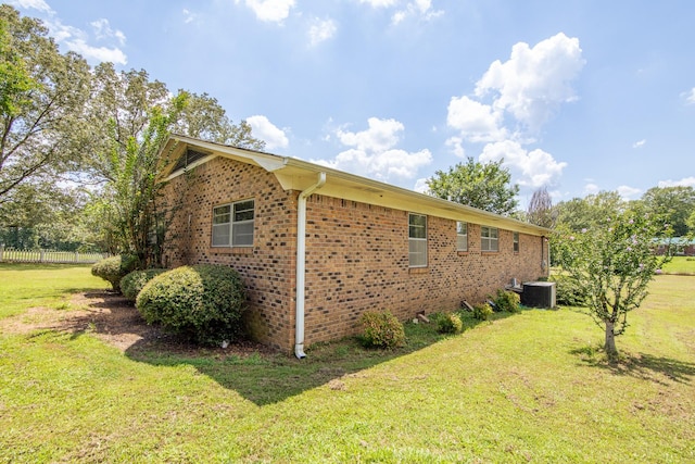 996 Matrose Carrolls Rd, Michie, TN 38357 - view of side of home with brick siding and a central AC unit