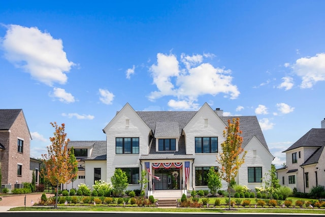 8869 Edgecomb Dr, College Grove, TN 37046 - view of front facade featuring a chimney