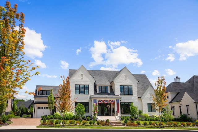 8869 Edgecomb Dr, College Grove, TN 37046 - view of front of property featuring driveway and a garage