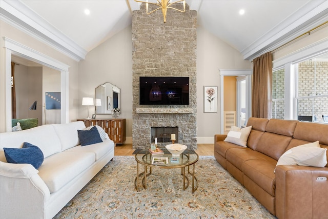 2157 Abiff Rd, Burns, TN 37029 - living area featuring a stone fireplace, crown molding, wood finished floors, high vaulted ceiling, and recessed lighting