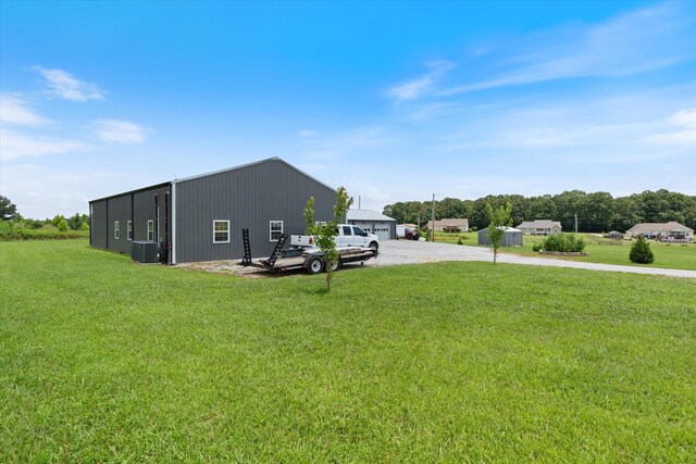 2157 Abiff Rd, Burns, TN 37029 - view of green lawn featuring an outbuilding and driveway