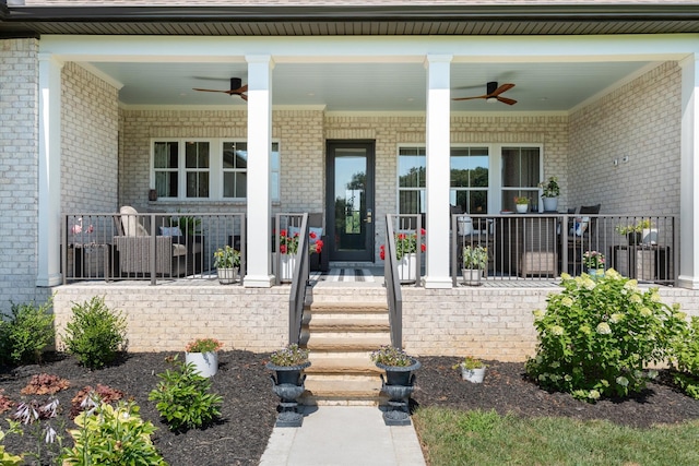 2157 Abiff Rd, Burns, TN 37029 - view of exterior entry featuring a ceiling fan, covered porch, and brick siding