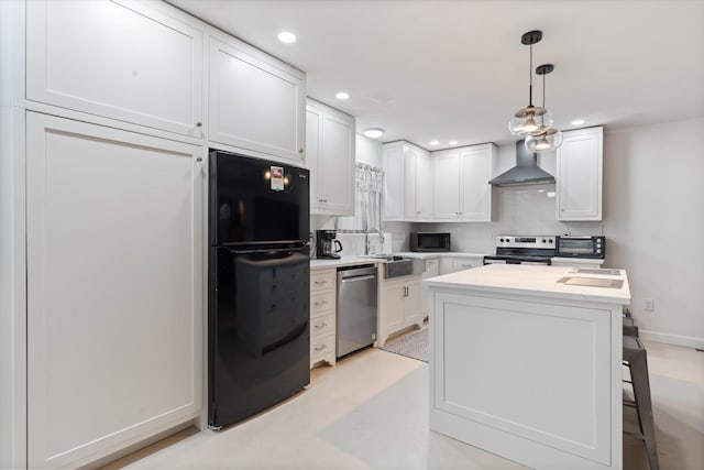 2157 Abiff Rd, Burns, TN 37029 - kitchen with black appliances, wall chimney range hood, decorative backsplash, white cabinets, and recessed lighting