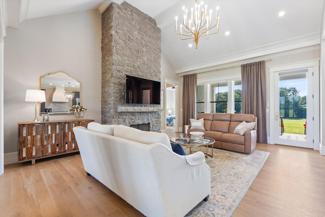 2157 Abiff Rd, Burns, TN 37029 - living area with a stone fireplace, a chandelier, light wood-style flooring, recessed lighting, and high vaulted ceiling
