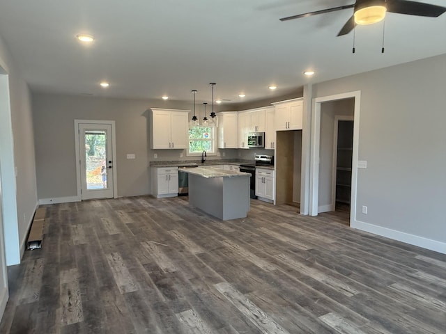7 Willow Way, Mcminnville, TN 37110 - kitchen with appliances with stainless steel finishes, ceiling fan, a kitchen island, white cabinetry, and recessed lighting