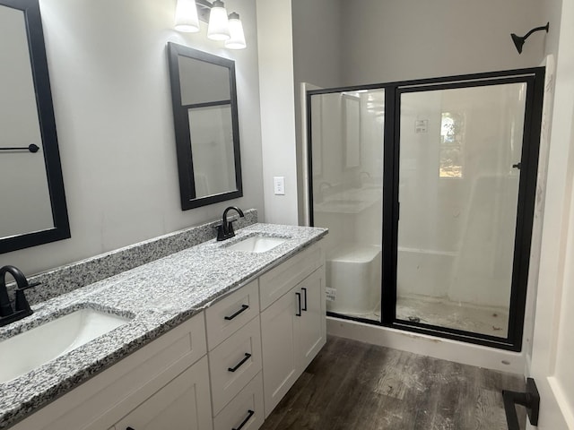 7 Willow Way, Mcminnville, TN 37110 - bathroom featuring wood finished floors, a stall shower, and double vanity