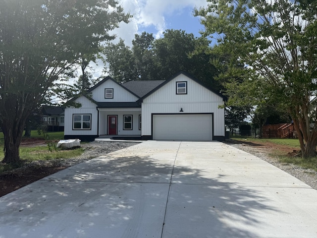 7 Willow Way, Mcminnville, TN 37110 - modern farmhouse with an attached garage and driveway