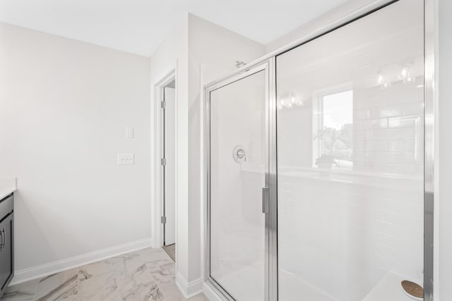 2208 Melk Ln, Columbia, TN 38401 - bathroom with marble look tile flooring, a shower stall, and vanity