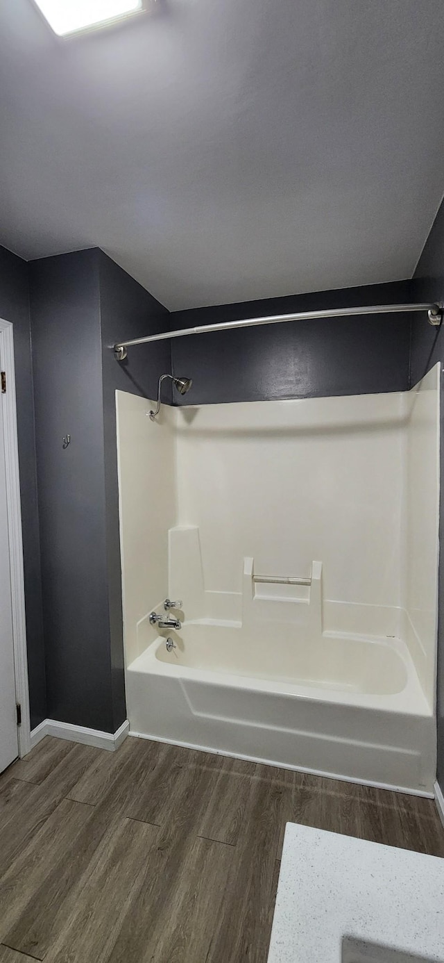 2877 Bryant Rd, Culleoka, TN 38451 - bathroom featuring wood finished floors and shower / bathtub combination