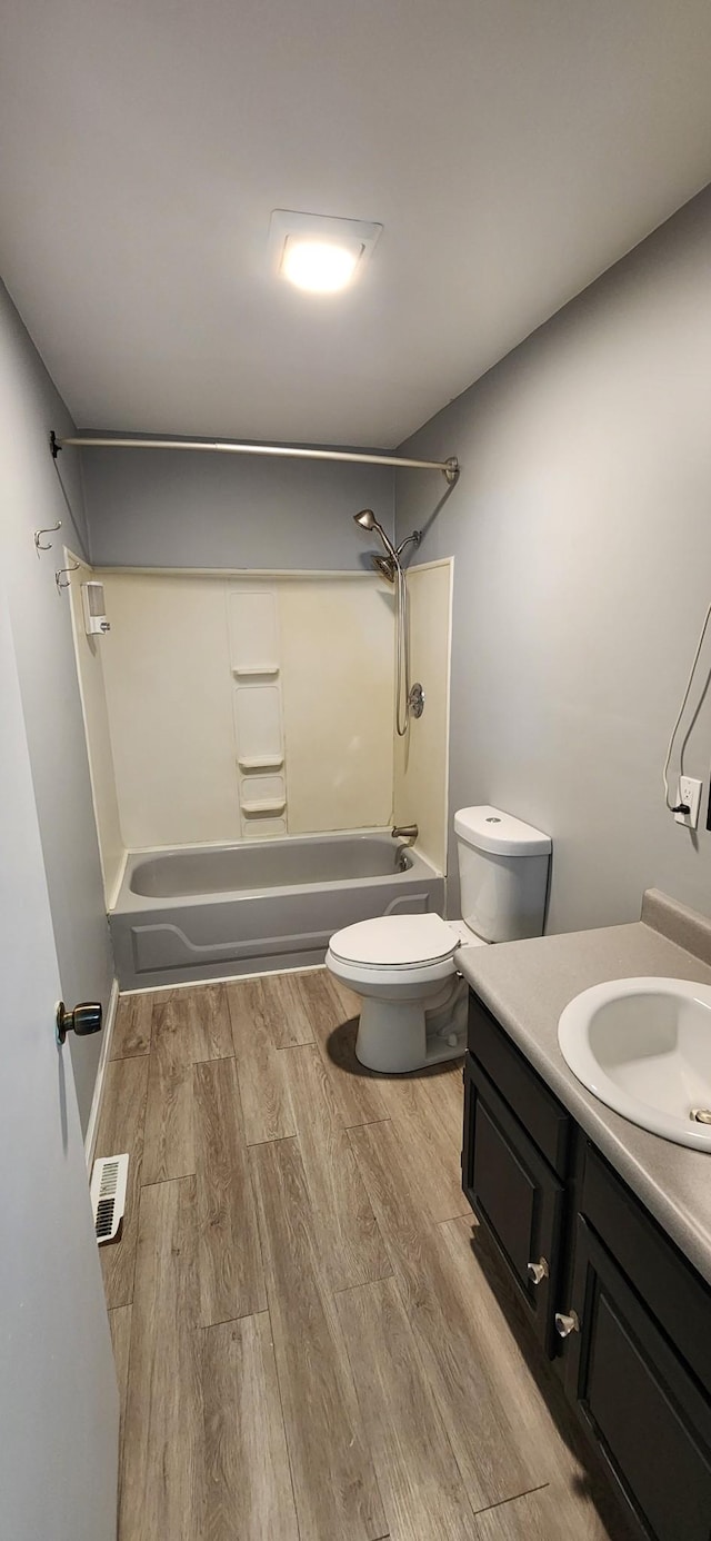 2877 Bryant Rd, Culleoka, TN 38451 - bathroom featuring shower / washtub combination, wood finished floors, and vanity