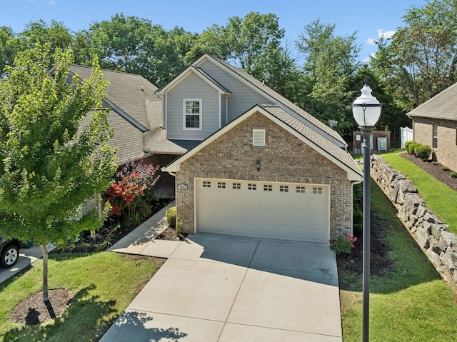 1037 Irish Way, Spring Hill, TN 37174 - view of front of property with driveway, a front lawn, brick siding, and a garage