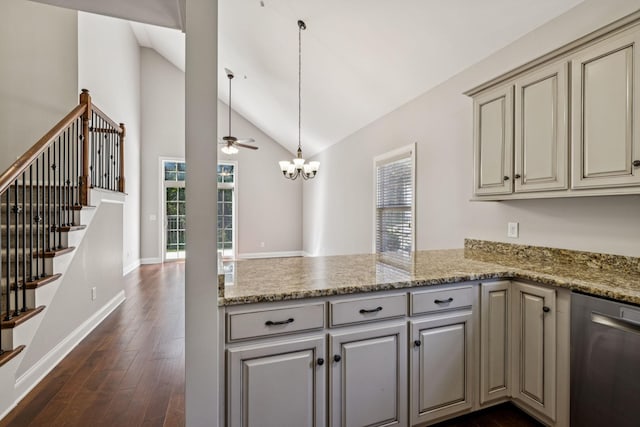 1037 Irish Way, Spring Hill, TN 37174 - kitchen featuring dishwasher, a peninsula, dark wood finished floors, cream cabinetry, and high vaulted ceiling