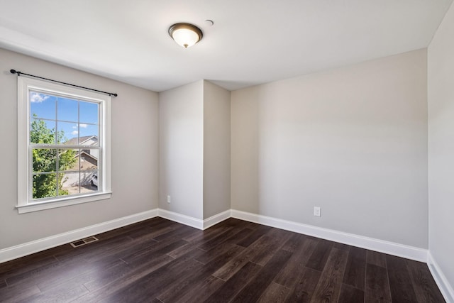 1037 Irish Way, Spring Hill, TN 37174 - empty room featuring dark wood-style flooring and baseboards