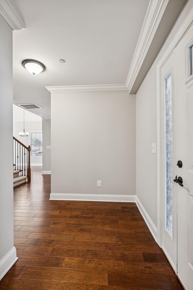 1037 Irish Way, Spring Hill, TN 37174 - foyer entrance with a chandelier, crown molding, stairway, and dark wood-type flooring