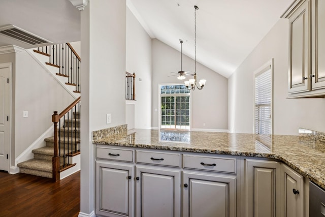 1037 Irish Way, Spring Hill, TN 37174 - kitchen with a peninsula, dark wood-style floors, gray cabinetry, light stone countertops, and high vaulted ceiling
