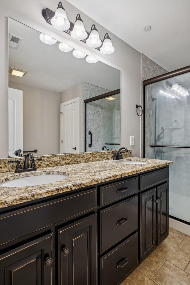 1037 Irish Way, Spring Hill, TN 37174 - full bath with double vanity, a stall shower, and tile patterned floors
