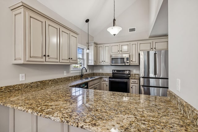 1037 Irish Way, Spring Hill, TN 37174 - kitchen with black appliances, vaulted ceiling, a peninsula, stone countertops, and pendant lighting