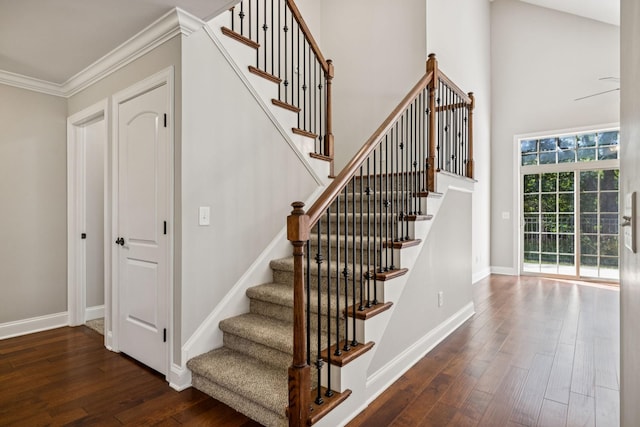 1037 Irish Way, Spring Hill, TN 37174 - stairs with wood finished floors, crown molding, and a high ceiling