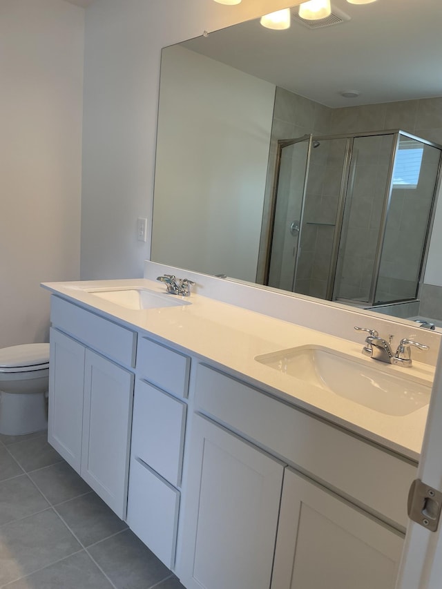 462 Jet Stream Dr, La Vergne, TN 37086 - bathroom featuring double vanity, a shower stall, and tile patterned floors