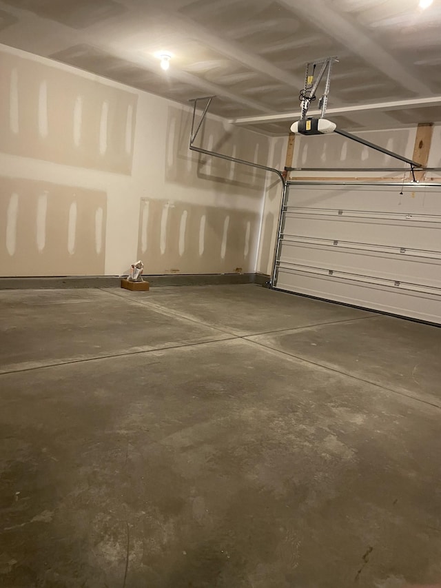 462 Jet Stream Dr, La Vergne, TN 37086 - garage with baseboards and a garage door opener
